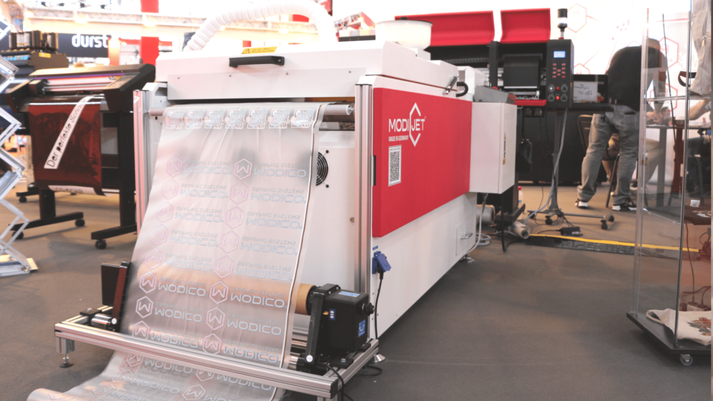 Modijet DTF production system shown at FESPA 23 in Munich.